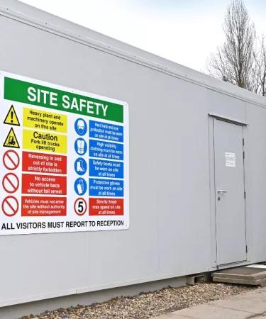 Algeco Monobloc Portable Cabin with Site Safety signage