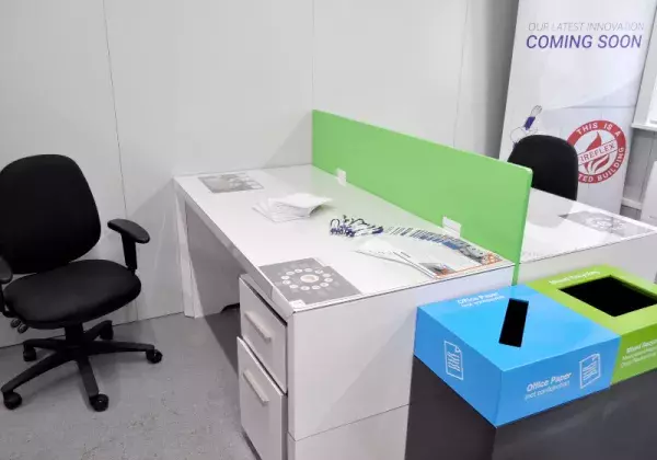 Turnkey office solutions including desk, chair and recycling boxes