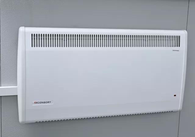 Consort heating for site accommodation to maintain healthy working conditions